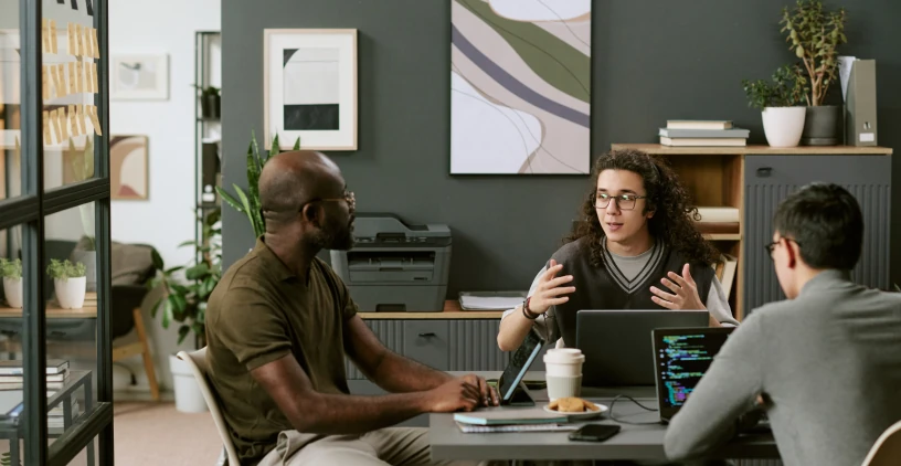 Technology professionals working in a corporate environment.